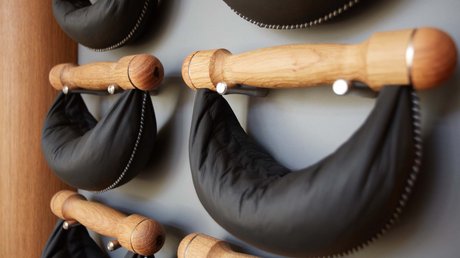 Pictures of a dream holiday in Bad Tölz Black padded neck rests on wooden wall mounts