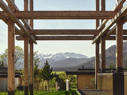A holiday amidst nature in Germany Wooden construction with view of mountains and green landscape in the background