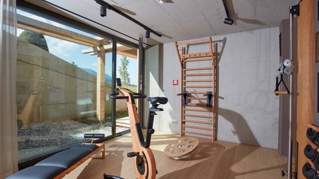 Pictures of a dream holiday in Bad Tölz Modern wooden fitness equipment in a bright gym room with window to terrace